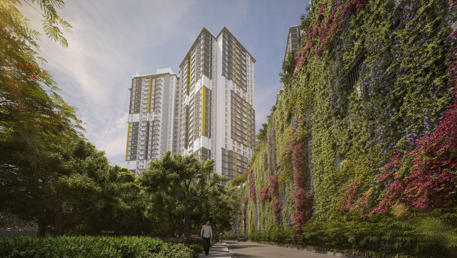 A driveway beside a planted wall with the towers beyond, in a developer render